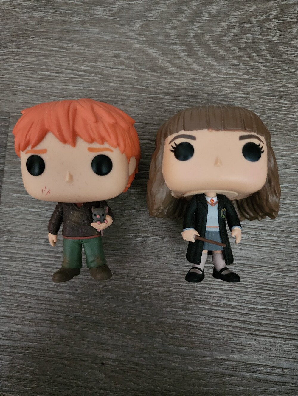 Ron and Hermione Funko Pops